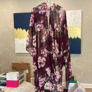 Brand new. Never worn Beach Cover Up!